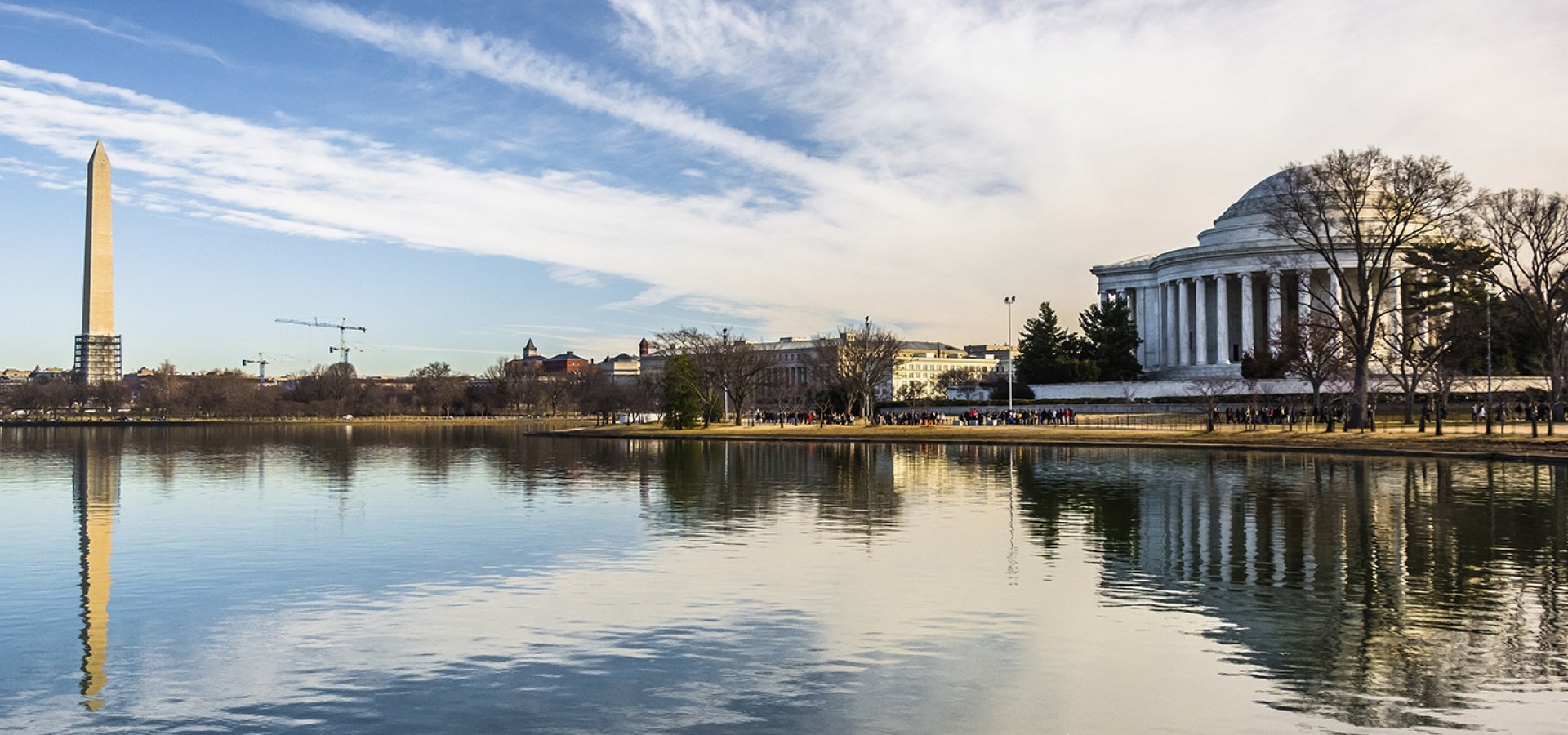 The Washington Monument and Thomas Jefferson Memorial reflecting Washington, DC Rail Vacations