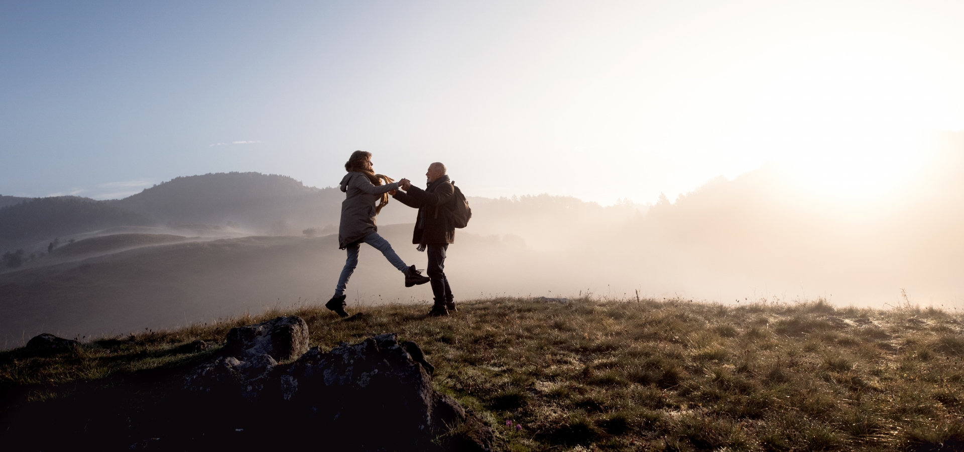 happy couple exploring during train vacation with Amtrak Vacations