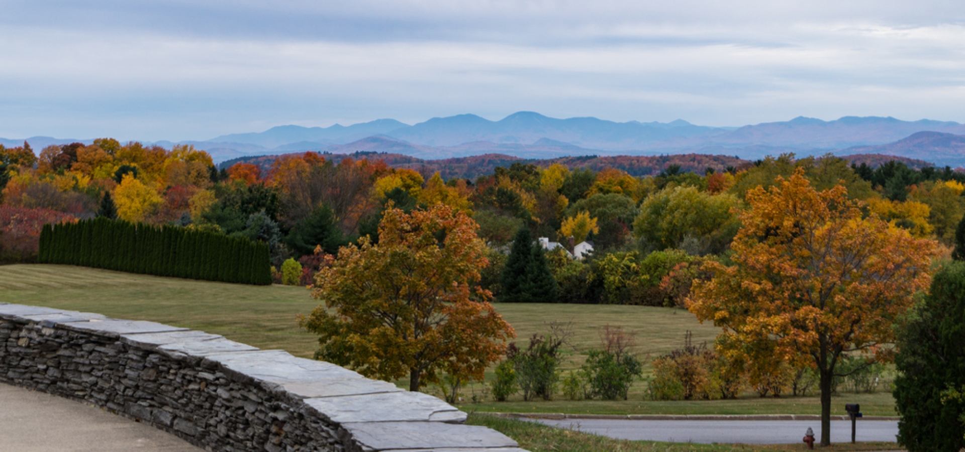 view of fall foliage and Adirondack  Mountains in New York  from Overlook Park in South Burlington, Vermont