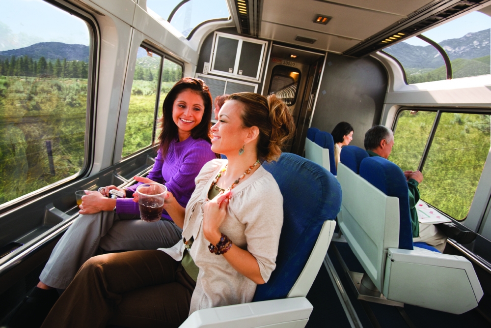 friends in the sightseer car having drinks